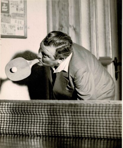 Press photograph of Erich Stegmann playing table tennis with his mouth