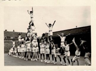 A group of kids at gym practice.