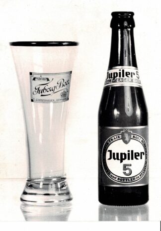 Photograph of Jupiler 5 bottle next to a tuborg beer glass - undated