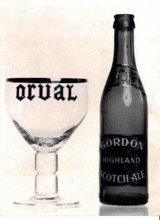 Photograph of a Gorden Highland Scotch-Ale bottle next to a Orval beer glass - undated