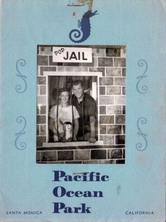 Photograph of a couple posing in pop jail. Stapled in Pacific Ocean Park frame. - 1958-1967