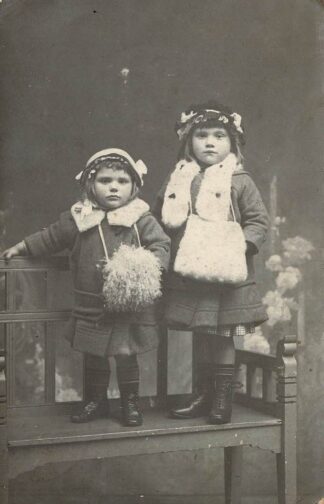 Sisters dressed up for winter - undated