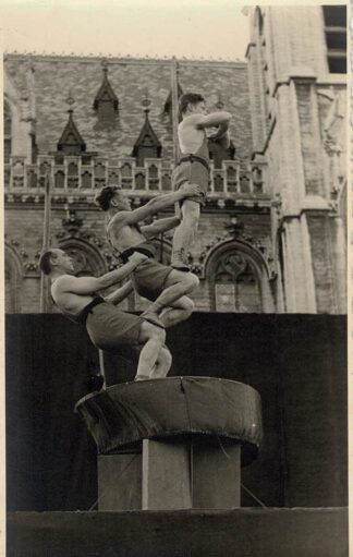 Three gymnasts doing what they're good at.
