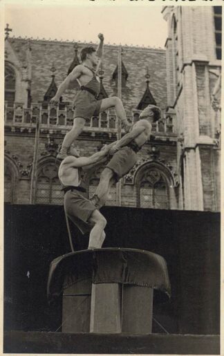 Three gymnasts doing what they're good at. (3)