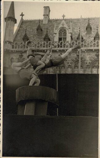 Three gymnasts doing what they're good at. (4)