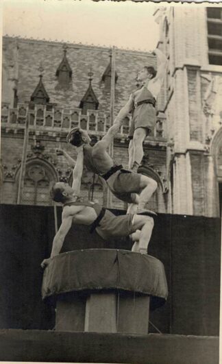 Three gymnasts doing what they're good at. (5)